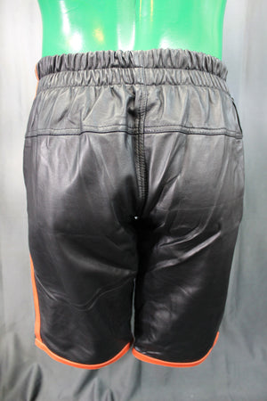 Short de basket-ball en noir et orange