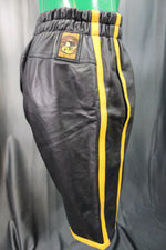 Pantalones cortos de baloncesto en negro y amarillo