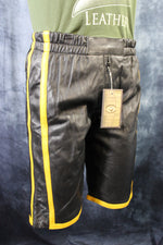 Pantalones cortos de baloncesto en negro y amarillo mostaza