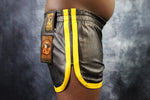 Shorts tipo botín OnF en negro con amarillo