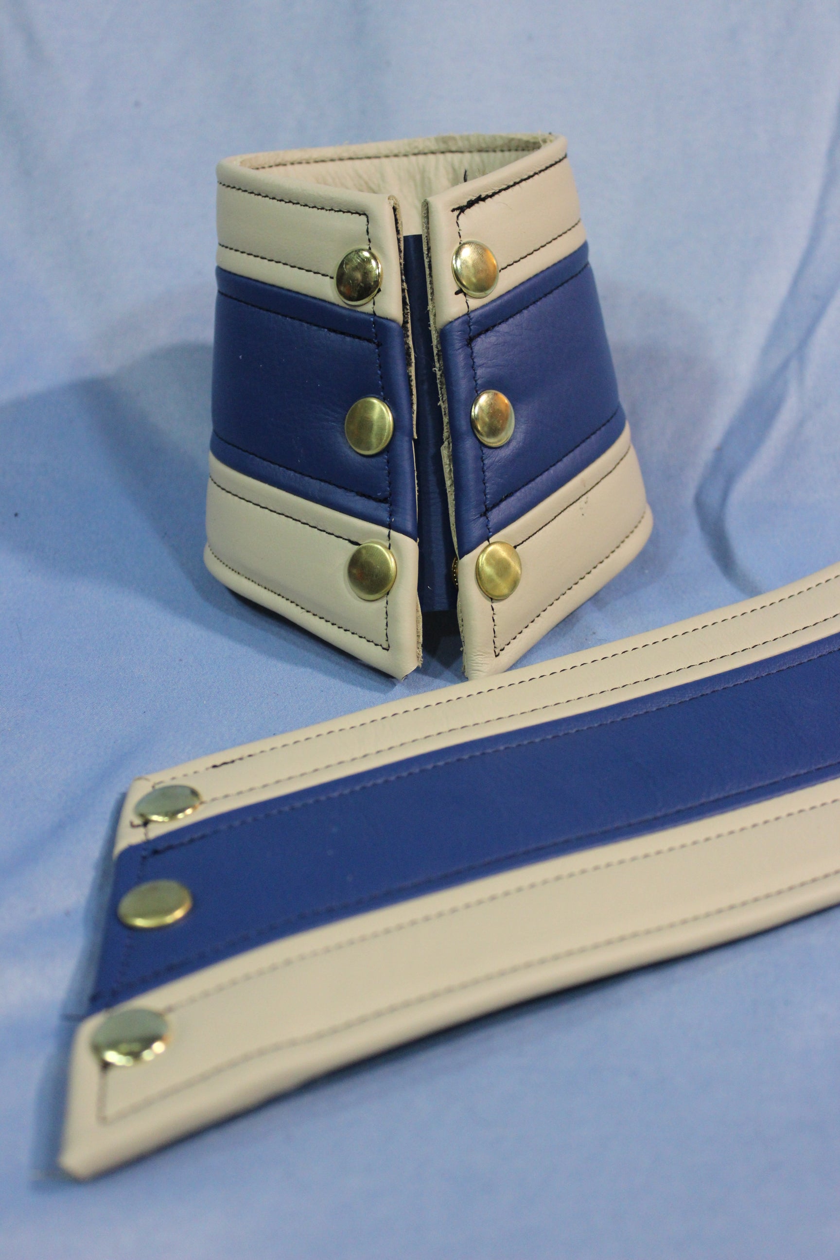 White and Blue Bracers