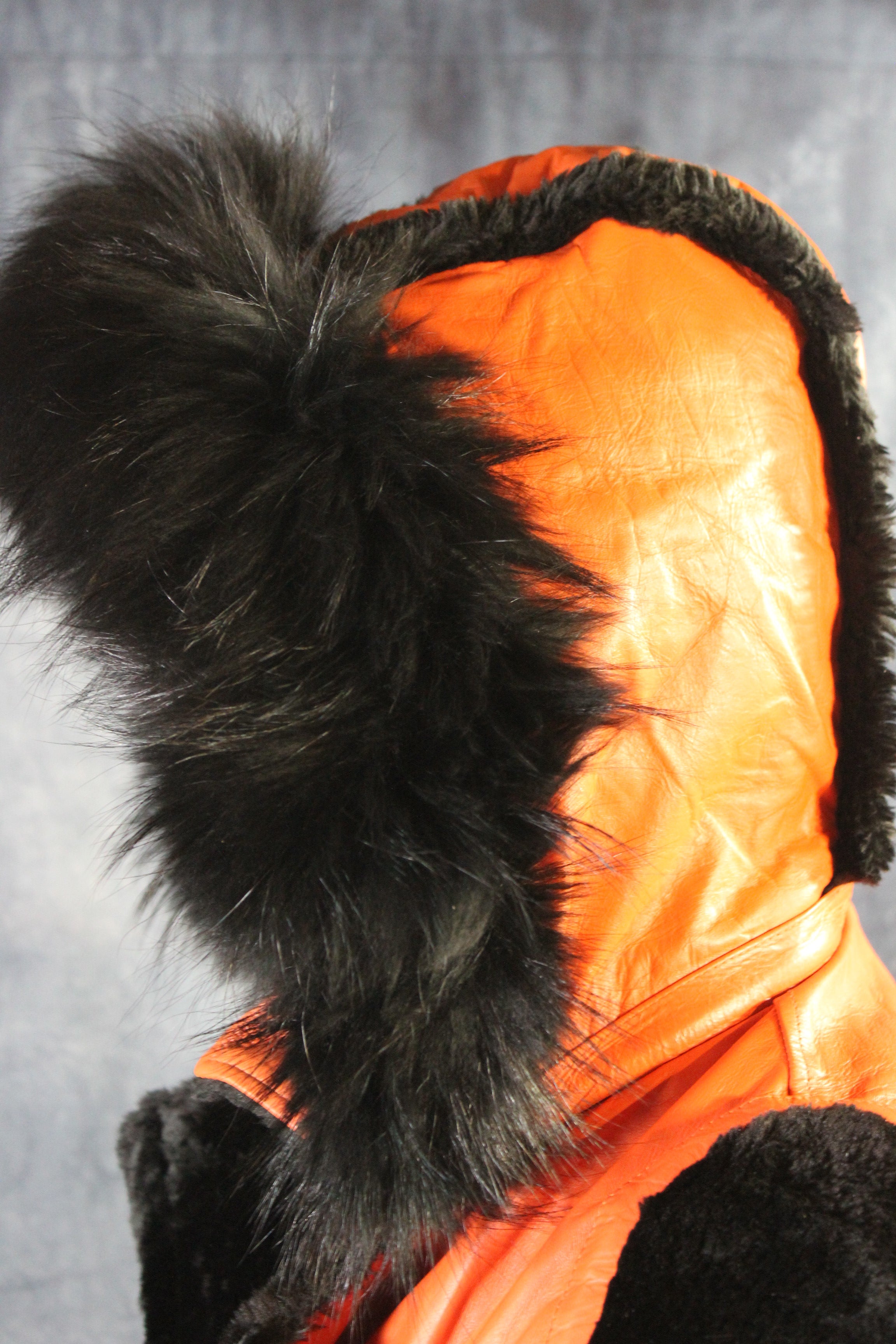 Chaqueta de cuero y piel naranja de Otter and The Fox