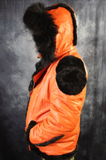 Veste en cuir et fourrure orange par Otter and The Fox