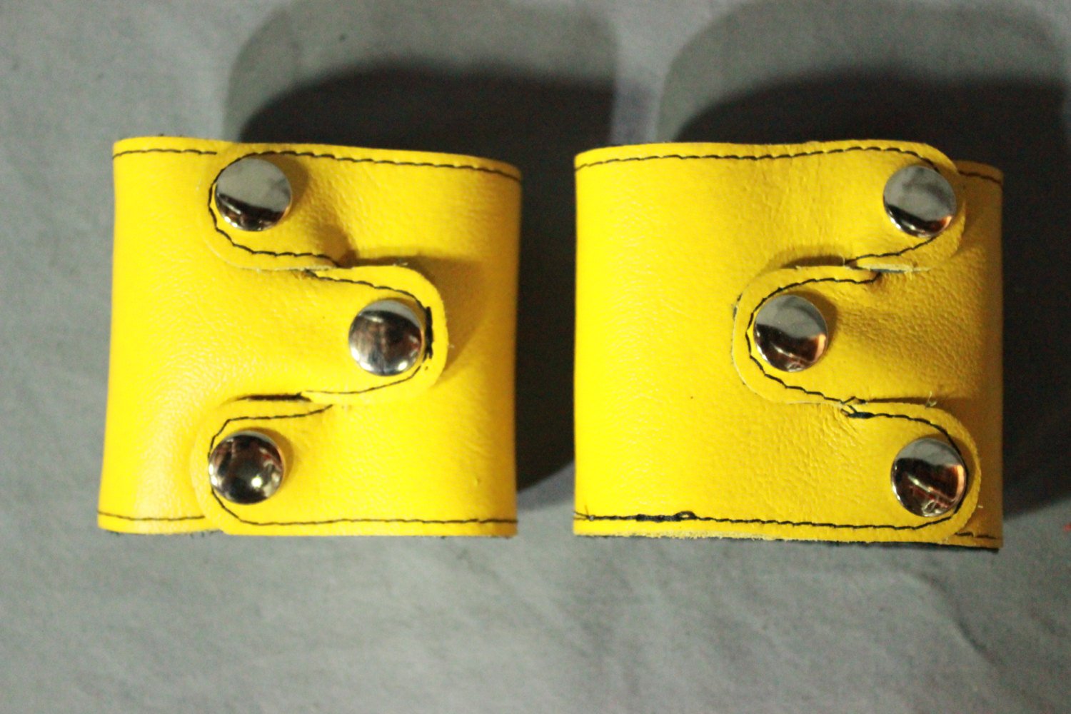 SPECIAL DEAL! Buy two tri-point YELLOW cuffs and save!