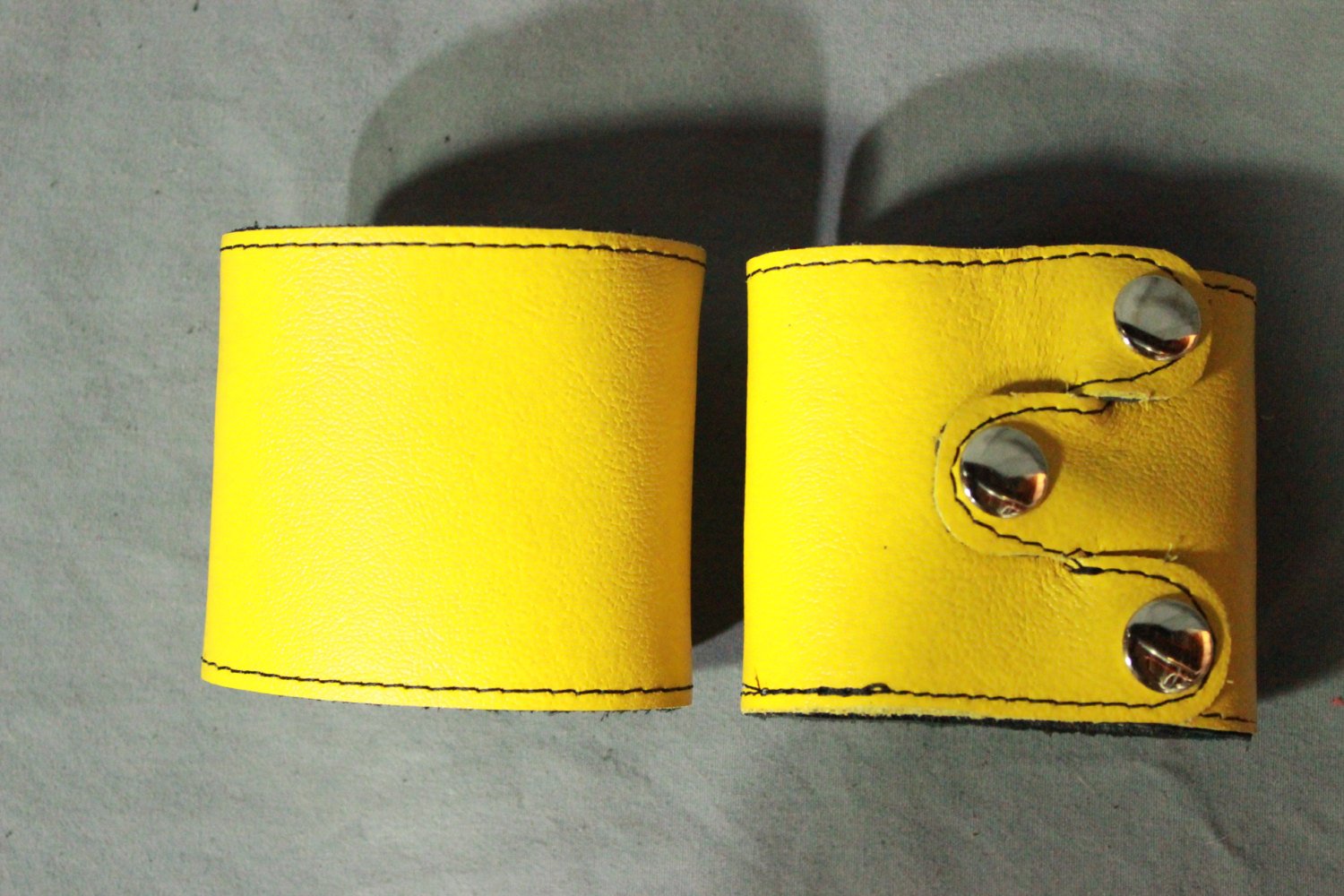 SPECIAL DEAL! Buy two tri-point YELLOW cuffs and save!